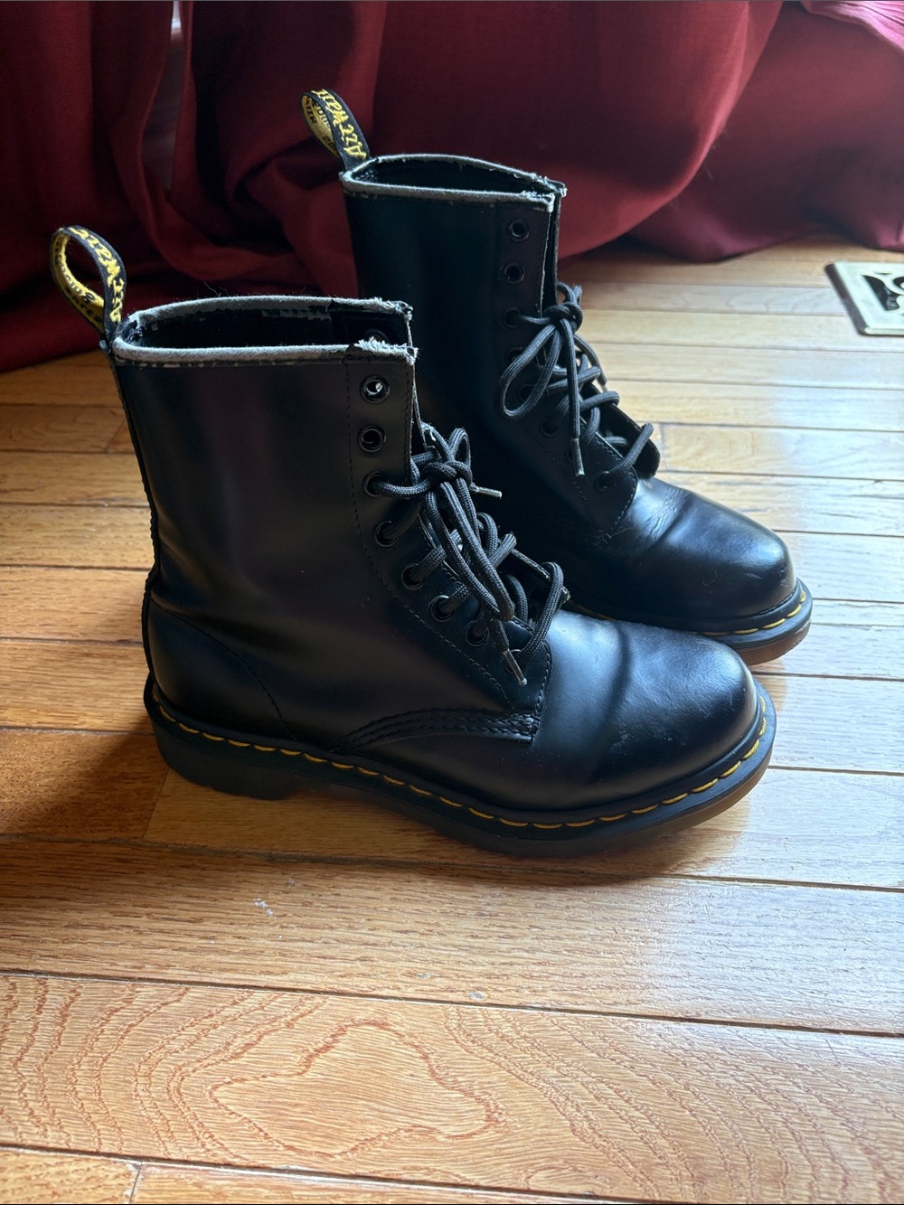 Dr. Martens Black Leather Combat Boots with Yellow Stitching